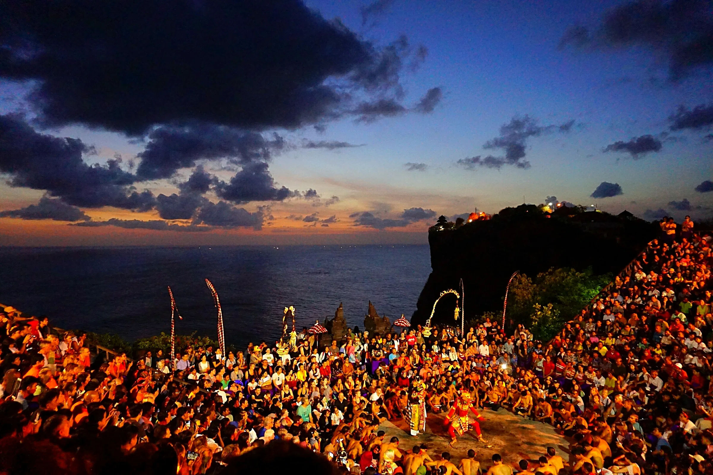 The Kecak performance in the cliff-top amphitheatre at Uluwatu Temple after sunset