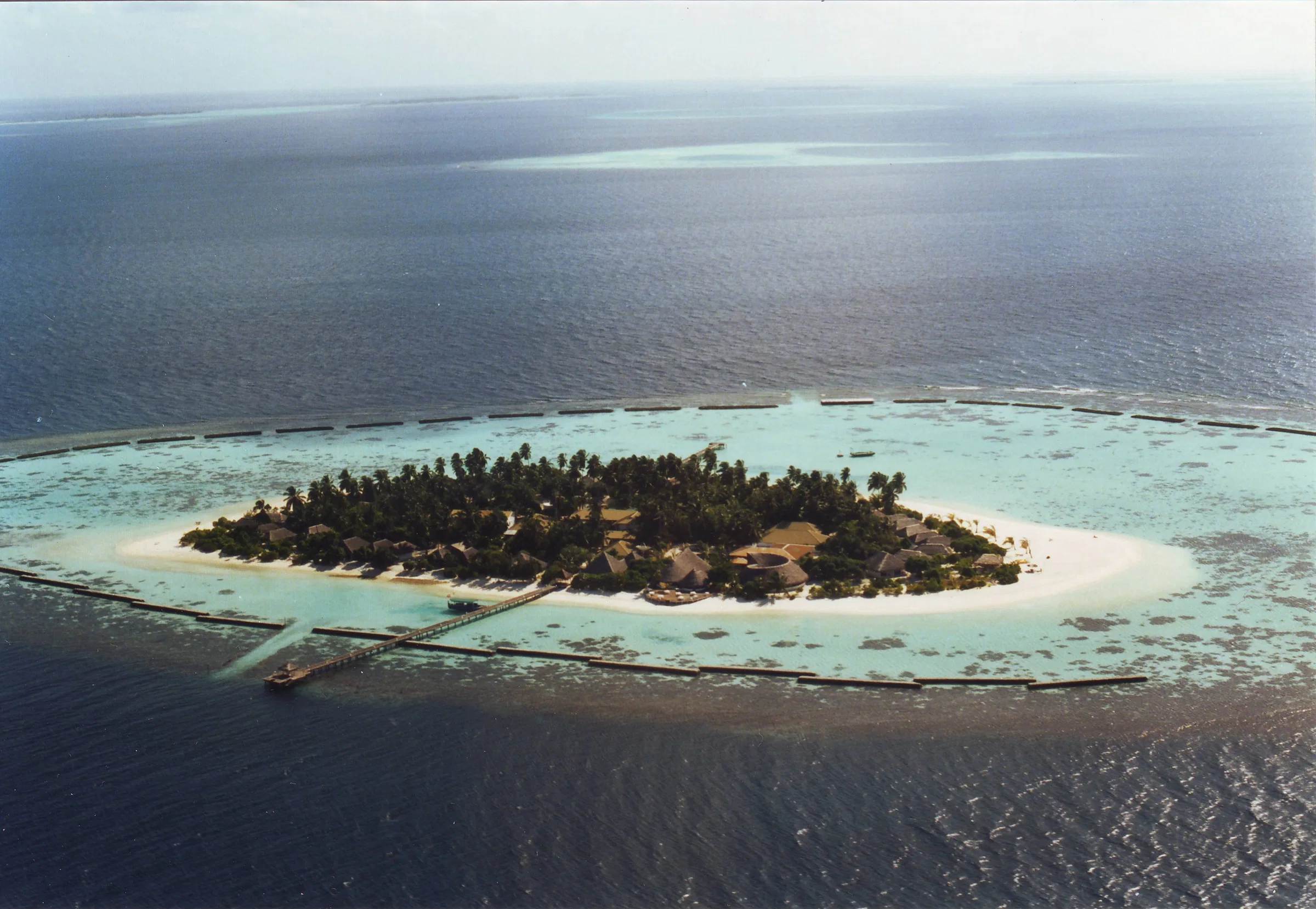 Vakarufalhi island ringed by white sand and reef, South Ari Atoll