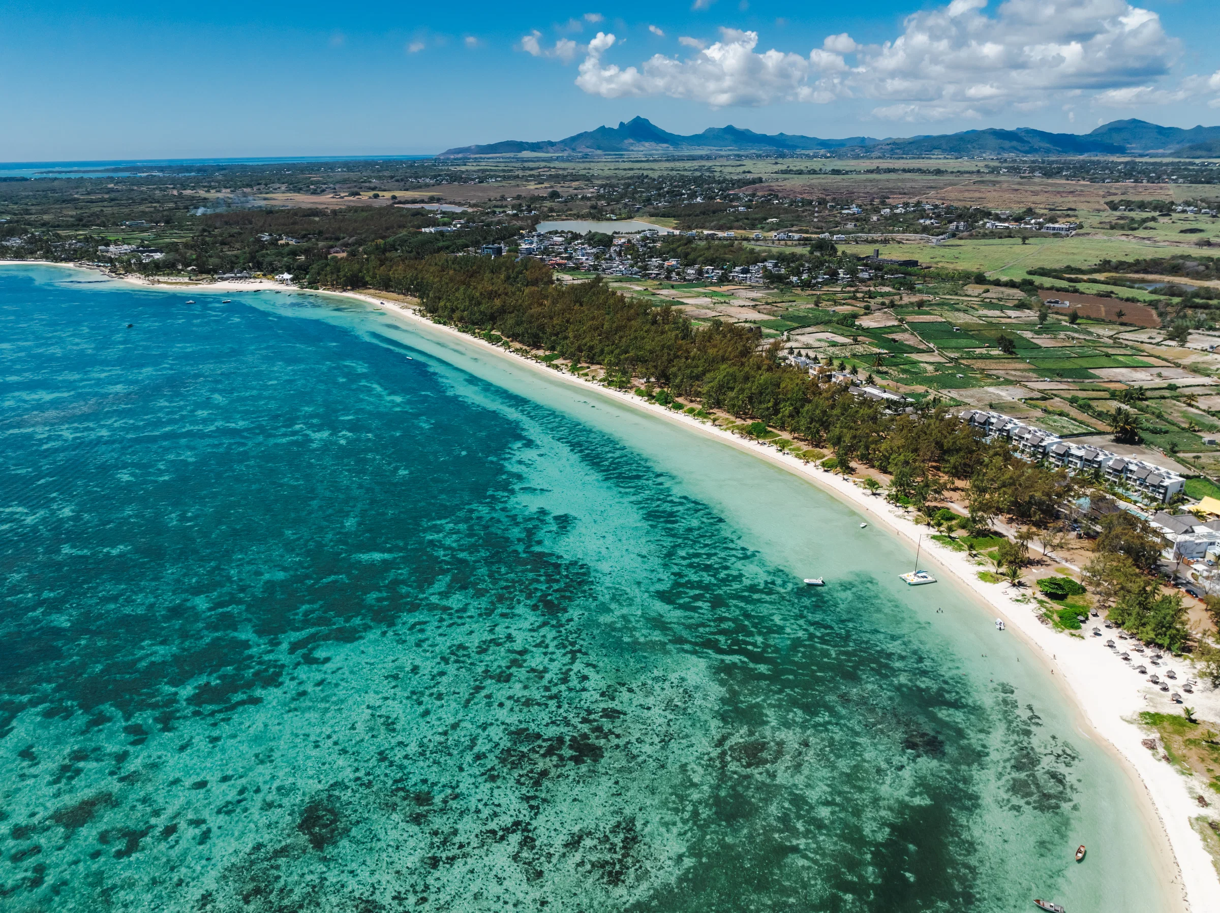 Aerial view of the long beach and reef at Belle Mare, east coast of Mauritius