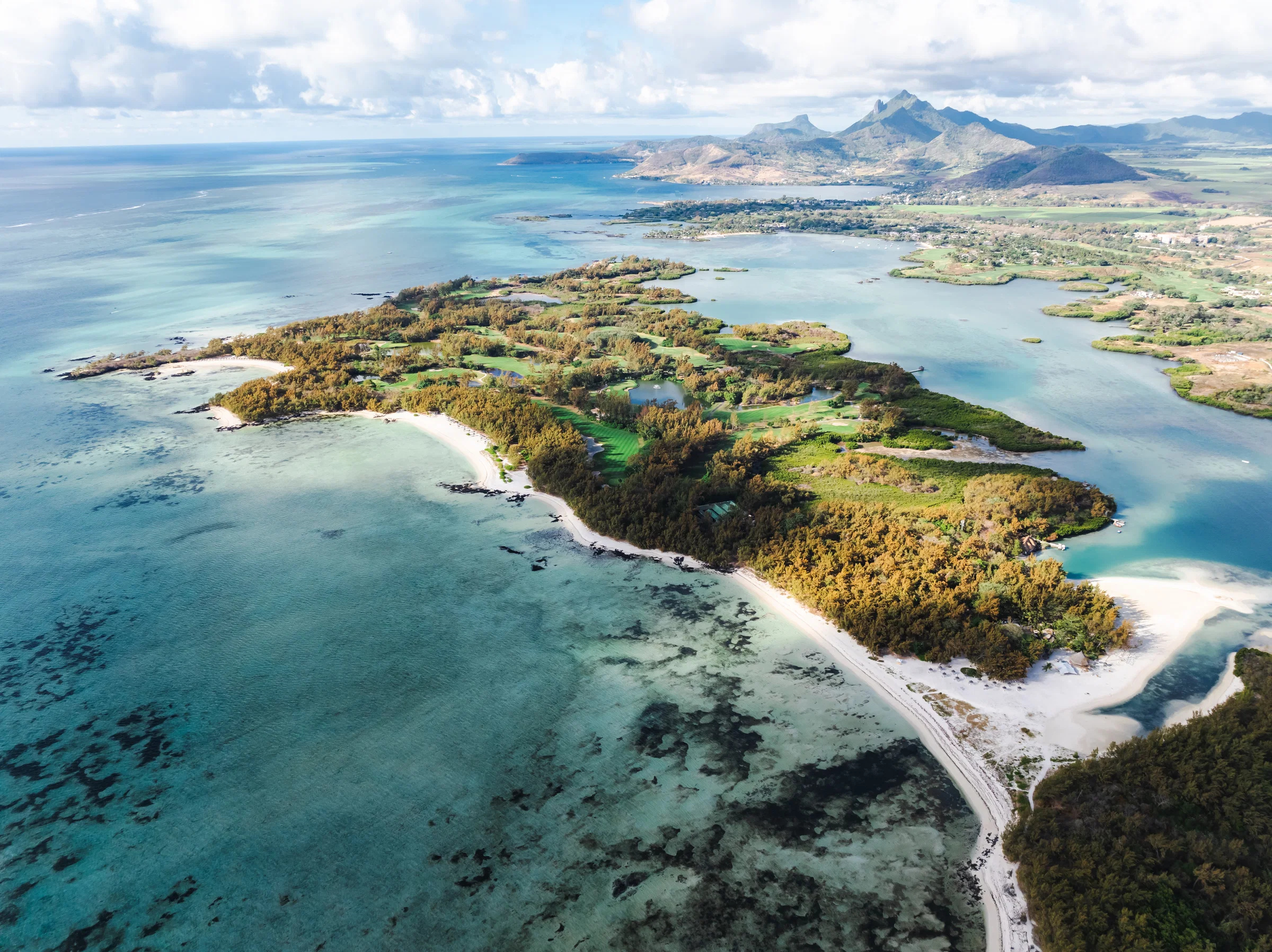 Aerial view of Île aux Cerfs, its sandbanks and the lagoon off the east coast of Mauritius