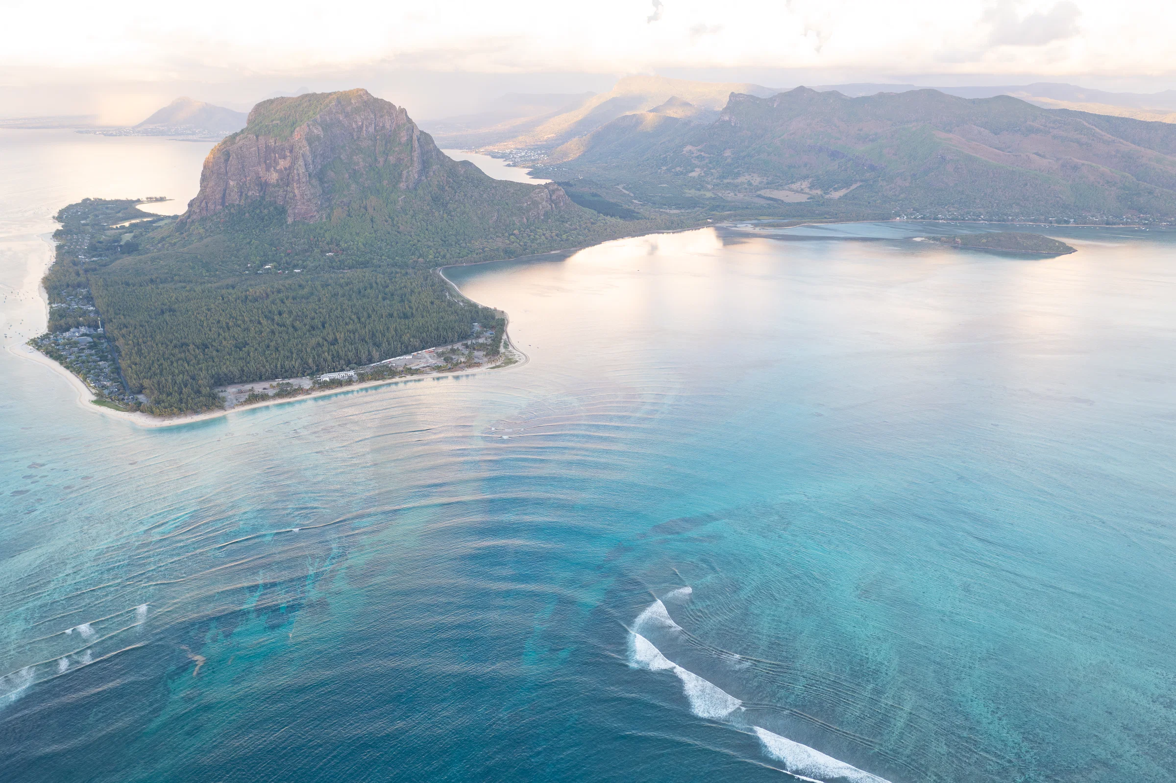 Aerial view of the underwater waterfall illusion off the south-west coast of Mauritius