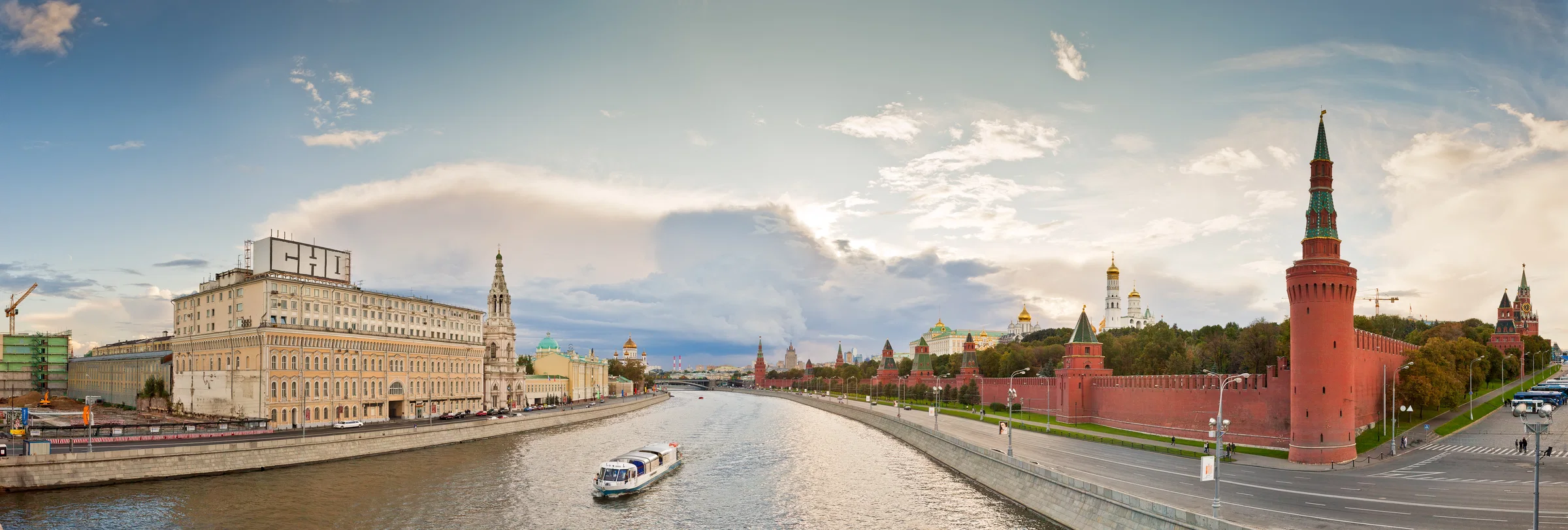 The Moskva River and the red walls and towers of the Kremlin seen from the Bolshoy Moskvoretsky Bridge