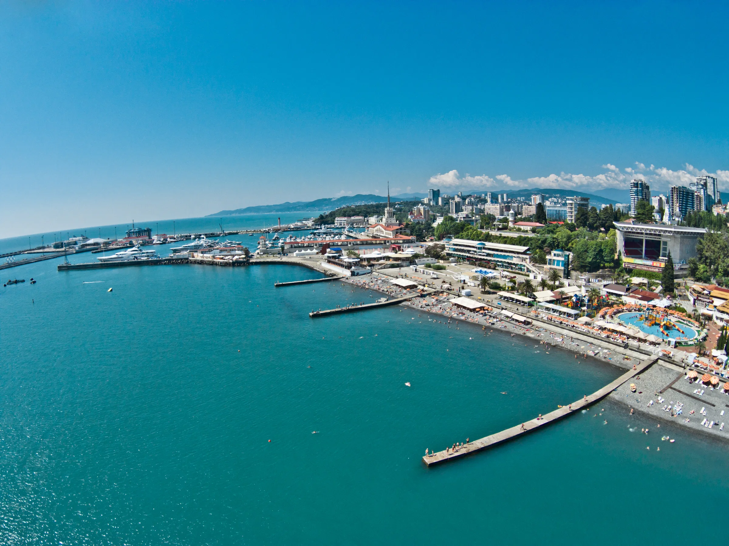 Aerial view of Mayak beach, the piers and the seafront of central Sochi on the Black Sea