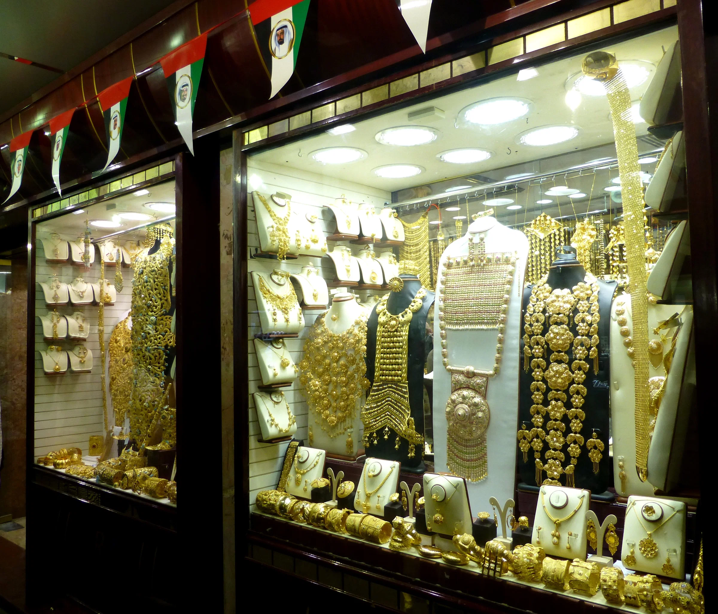 Gold jewellery displayed in a shop window in the Dubai Gold Souk