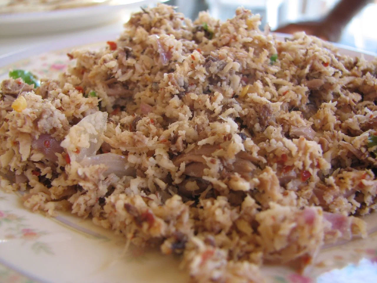 A plate of mas huni: shredded tuna with grated coconut, onion and chilli