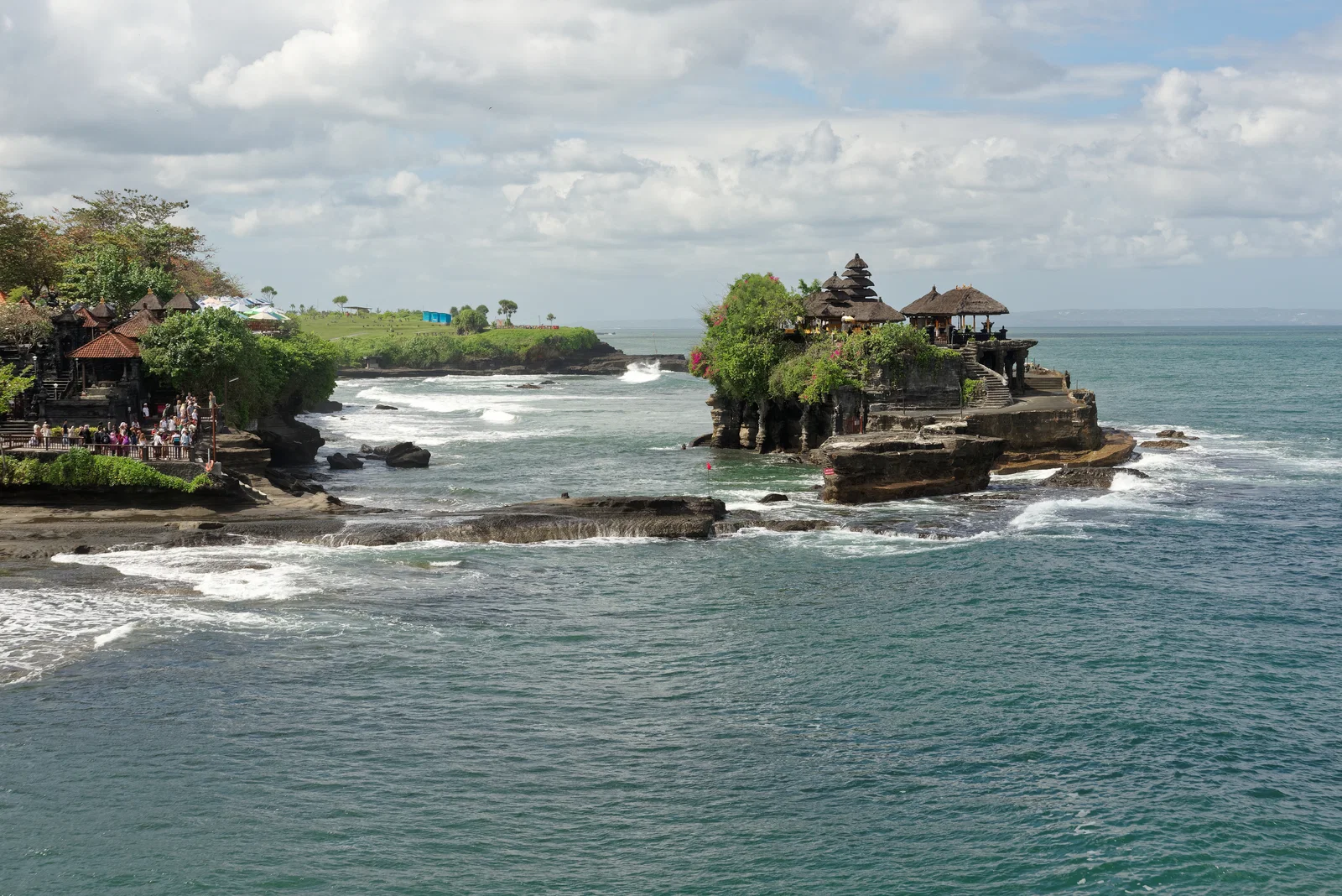 Tanah Lot temple on its rock in the sea at high tide