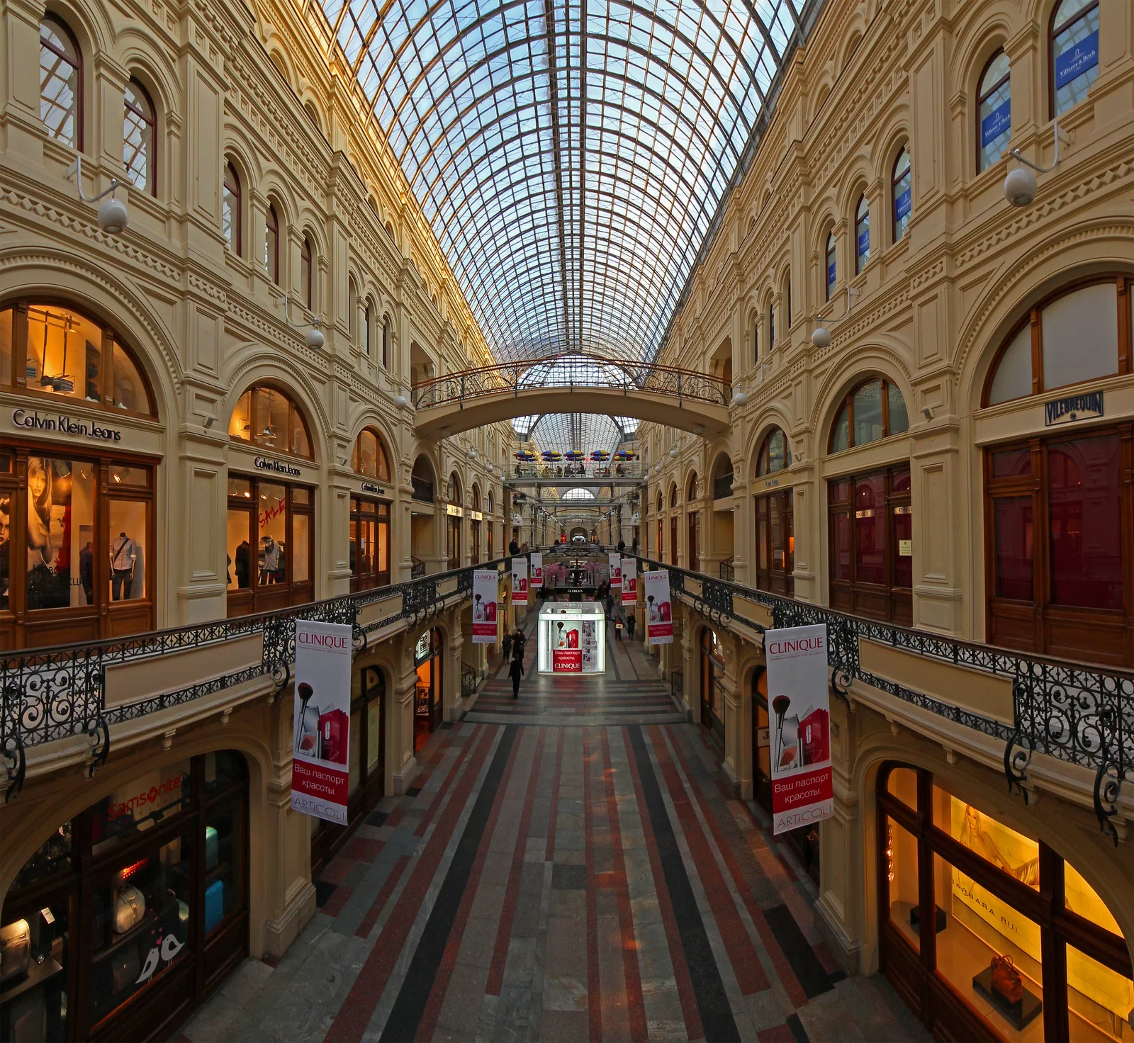 The central arcade of GUM in Moscow under its arched glass roof